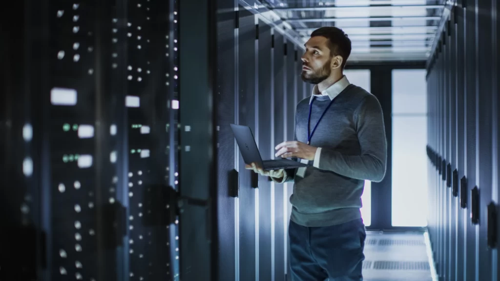 Man monitoring server rack